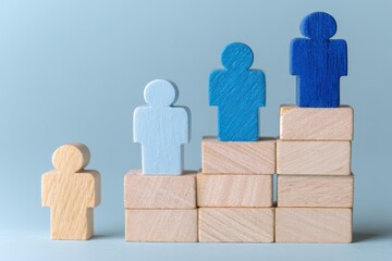 Wooden figures on a tiered block structure, light blue and beige/tan