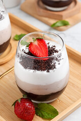 Chocolate mousse with strawberry topping.