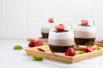 Chocolate mousse with strawberry topping.