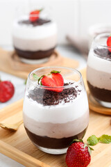 Chocolate mousse with strawberry topping.