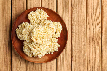 Rengginang or ranginang. Flavoured glutinous rice cracker.