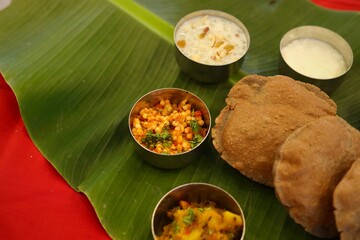 Navratri Upwas Thali  Fasting food platter on banana leaf background