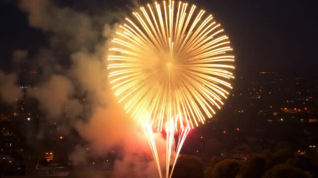 Drone's Night Flight over Luton Town of England. it was Asian wedding when they were enjoying the party and live fireworks, high angle view with drone's camera