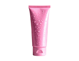 Pink cosmetic tube front view with water droplets on the surface and green leaves 