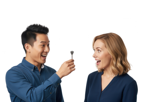 Excited Couple Receiving House Key, Isolated on White