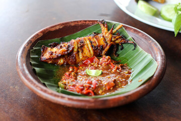 cumi bakar sambal. grilled squid with chili sambal.