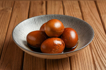 Telur pindang. Tea boiled egg. Indonesian or chinese traditional cuisine. perfect for recipe, article, or any commercial purposes. with copy space.