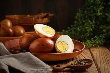 Telur pindang. Tea boiled egg. Indonesian or chinese traditional cuisine. perfect for recipe, article, or any commercial purposes. with copy space.