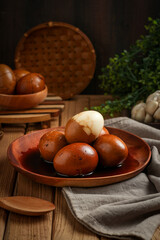 Telur pindang. Tea boiled egg. Indonesian or chinese traditional cuisine. perfect for recipe, article, or any commercial purposes. with copy space.