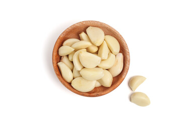Peeled garlic isolated on white background.