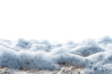 Foamy waves on a sandy shore