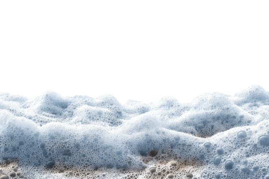 Foamy waves on a sandy shore
