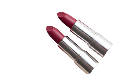 Two maroon lipsticks, close-up, metallic silver casing