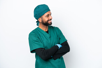 Surgeon Brazilian man in green uniform isolated on white background happy and smiling