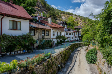Fototapeta premium Traditional Houses Along Stream in Mudurnu