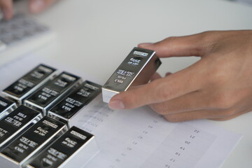 Silver Trading Businessman invest in trading  silver on the stock exchange price rising.