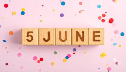 Wooden Blocks with Date 5 June. Calendar for birthday or anniversary on solid colored background with confetti
