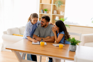 Family bonding moment in a cozy living room with fun activities and laughter
