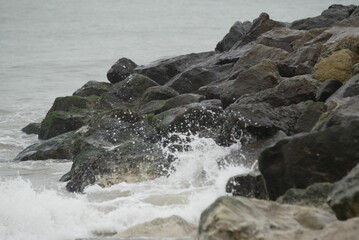 waves crashing on rocks