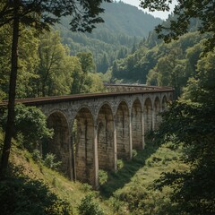 Obraz premium Scenic Railroad Bridge Passing Through Lush Greenery