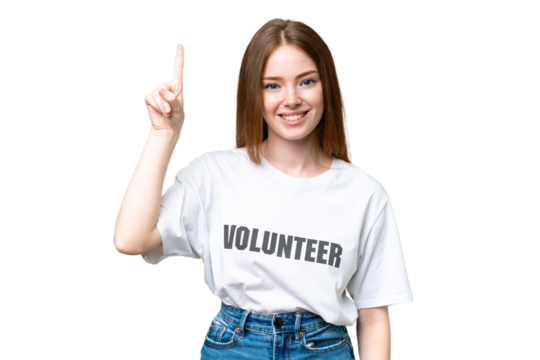 Young volunteer woman over isolated chroma key background pointing up a great idea