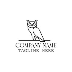 Elegant Owl Logo with Branch and Leaves