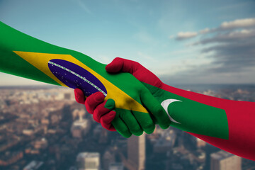 Shaking hands Brazil and Maldives