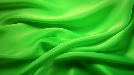 Fototapeta premium Green silk satin abstract background with smooth flowing fabric texture