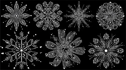 Set of dotted snowflakes on black background, white vector illustration suitable for print, clipart, and digital design projects
