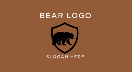 A stylized logo featuring a black bear silhouette inside a shield, with text above and below.