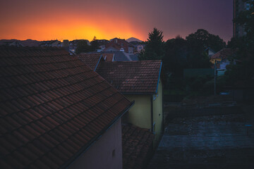 Balkan city at dusk with interesting colors in the sky