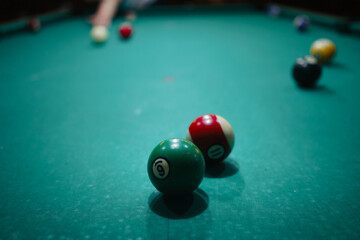 Playing pool in a night pub