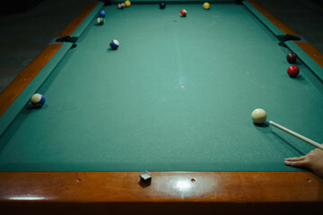 Playing pool in a night pub