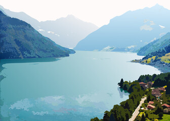 Serene mountain lake with village and lush green hillsides