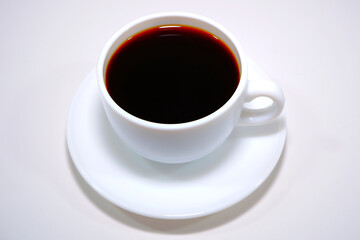 Cup of coffee with white background close-up view 