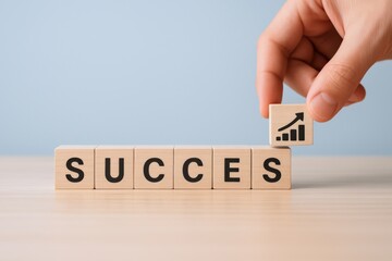 Building Success: Hand Placing Cube with Graph on Wooden Blocks, Business Growth Concept