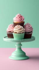 Assorted cupcakes in pastel pink frosting  dessert treats