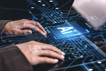 Hands typing on laptop with AI, chat, and bot interface overlay on screen.