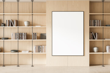 Modern interior with wooden bookshelves and vertical poster mockup framed on wall in minimalist...