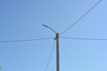 Overhead power line support with power lines, reinforced concrete poles with power lines, power wires, overhead lines, electric pole.