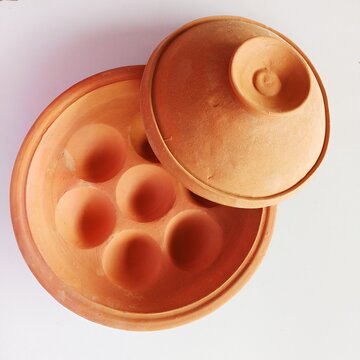 Chitoi Pitha Sanj, earthen mould cookware used to cook Chitoi Pitha in West Bengal