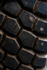 Close-up. Tractor or dump truck tire tread. Wheels for large machines.