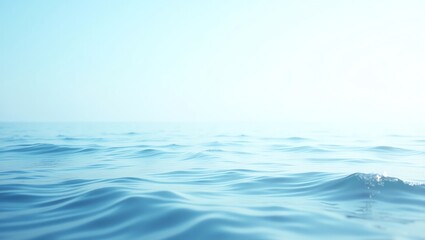 Naklejka premium Ocean surface with gentle waves and clear sky