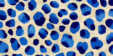 Leopard print fabric with blue leopard spots on a beige background, seamless pattern