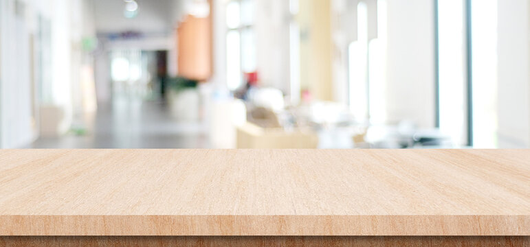 Empty wood table over blur office background, Stone desk for product display mock up template banner, white background
