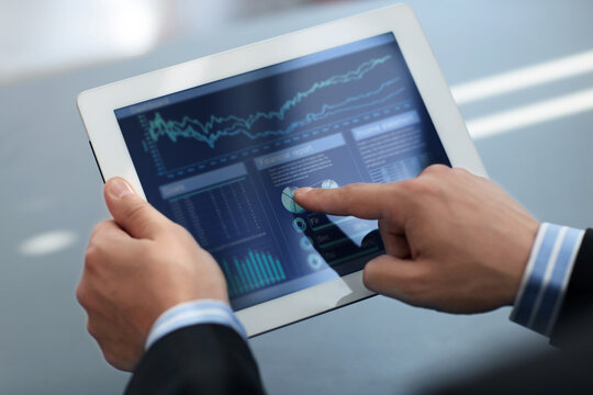 Businessman holding digital tablet