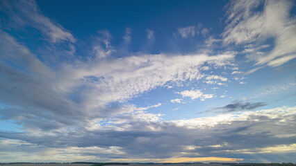 Dynamic and EverChanging Cloud Patterns Stretching Across a Beautiful Serene Horizon