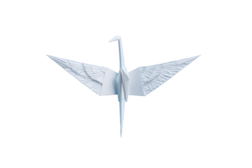 A white origami bird with its wings spread out