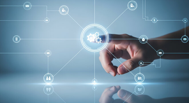 Finger touching an digital process automation icon triggering interconnected network system