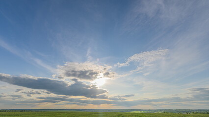 A stunning horizon displays dynamic cloud patterns that captivate the beholders attention